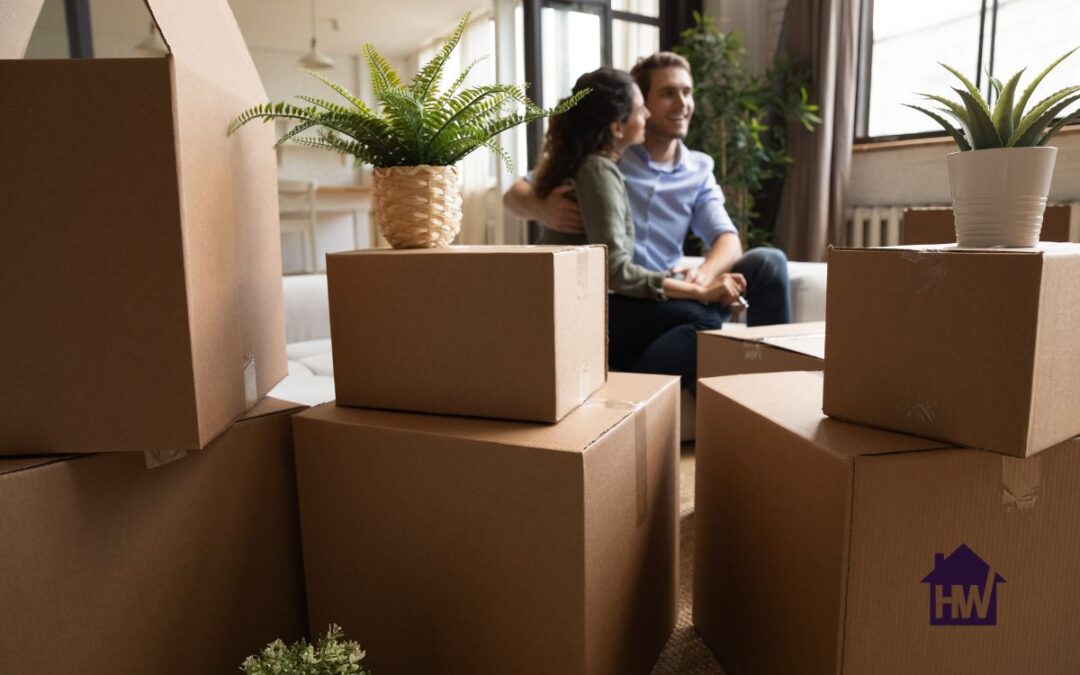 Couple in their new home - first-time home buyer mortgage tips from HS Advantage.